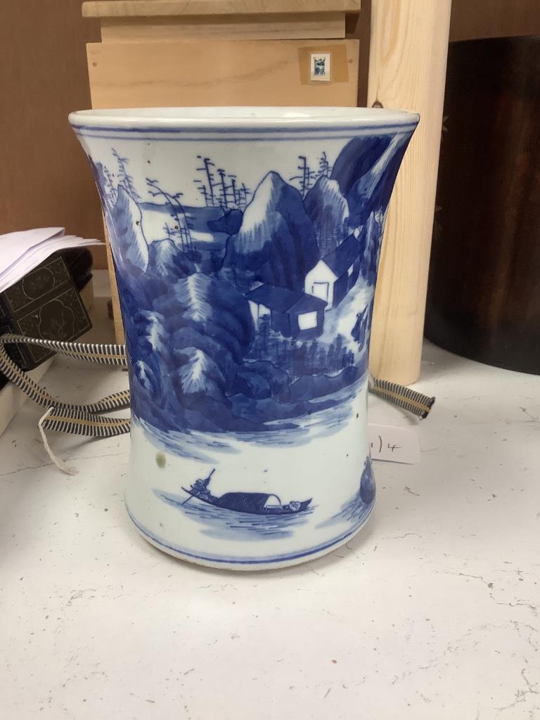 A Chinese blue and white porcelain brush pot, painted with a landscape, 17cm high, in later pine box